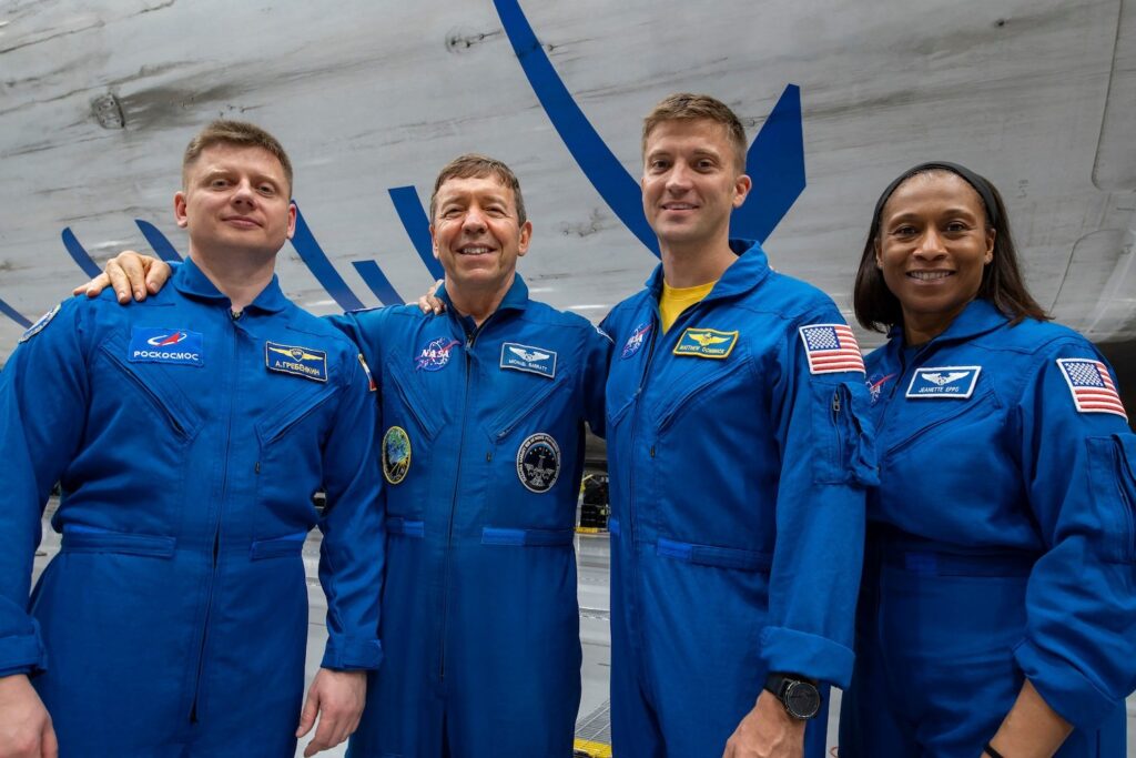 The four crew members that comprise the SpaceX Crew-8 mission pose for a photo inside SpaceX Hangar X at the Kennedy Space Center in Florida. Hangar X supports Falcon 9 rocket refurbishment and houses administration offices. From left are, Mission Specialist Alexander Grebenkin, Pilot Michael Barratt, Commander Matthew Dominick, and Mission Specialist Jeanette Epps.