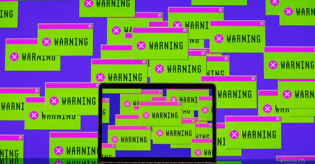 A laptop surrounded by green and pink message boxes that say “warning.”