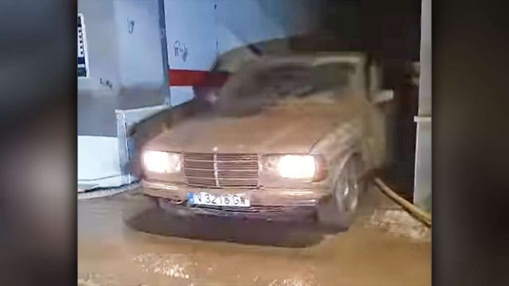 Tough as Nails Mercedes 300D Drives Out of Flooded Underground Garage Like It's Nothing