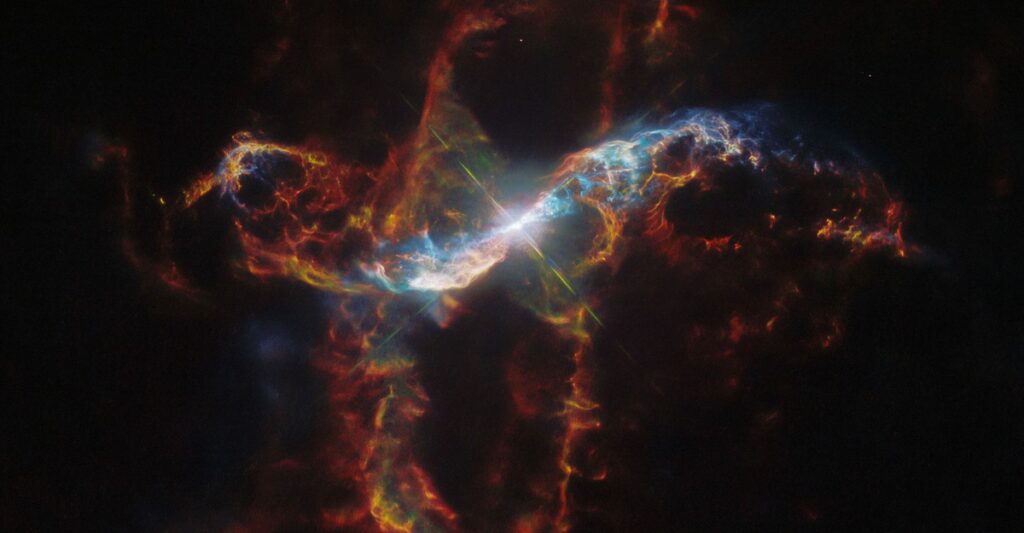 Day 23 of the 2024 Space Telescope Advent Calendar: A Spray of Glowing Filaments