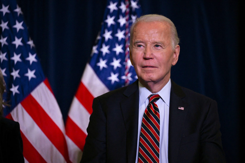 U.S. President Biden delivers remarks at the Democratic National Committee's Holiday Reception