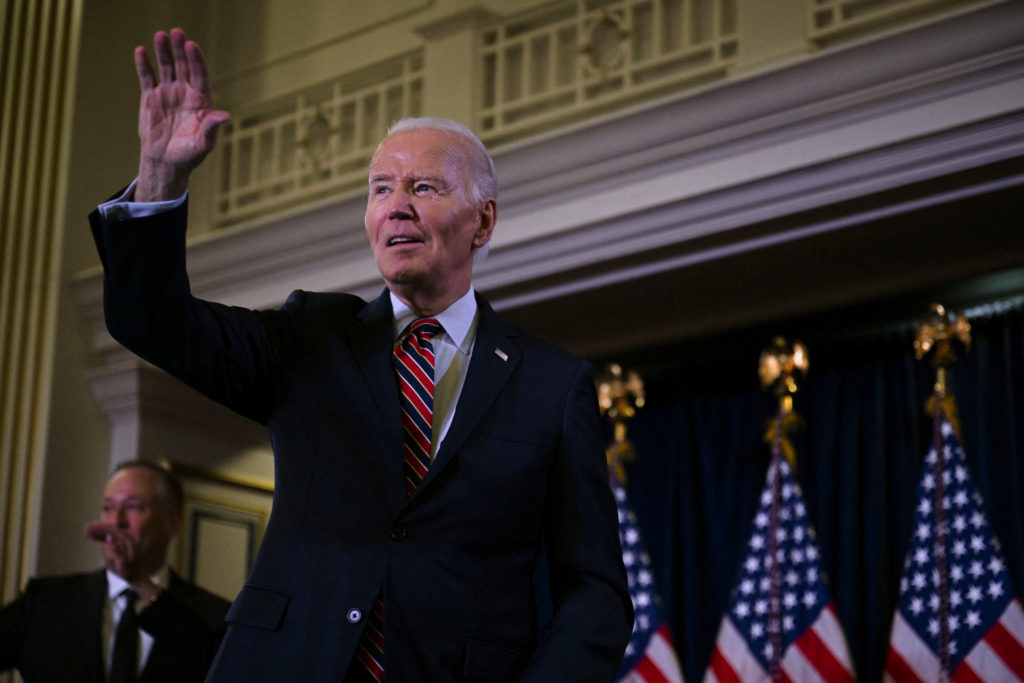 U.S. President Biden delivers remarks at the Democratic National Committee's Holiday Reception