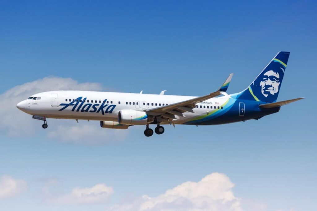 Anxiety drives woman to open an emergency exit and climb onto the wing of an Alaska Airlines flight