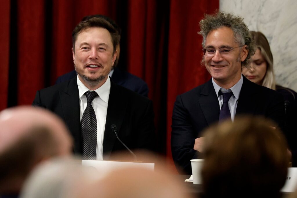 Tesla CEO Elon Musk (L) and Palantir CEO Alex Karp appear together on Capitol Hill