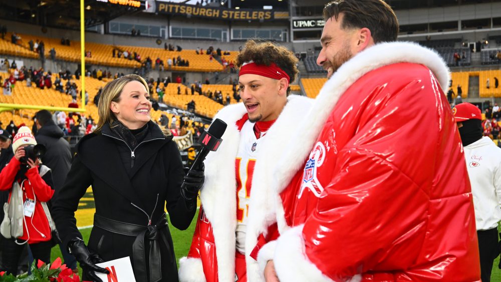 PITTSBURGH, PENNSYLVANIA - DECEMBER 25: Patrick Mahomes #15 and Travis Kelce #87 of the Kansas City Chiefs speaks with a NETFLIX reporter after the game against the Pittsburgh Steelers at Acrisure Stadium on December 25, 2024 in Pittsburgh, Pennsylvania. (Photo by Joe Sargent/Getty Images)