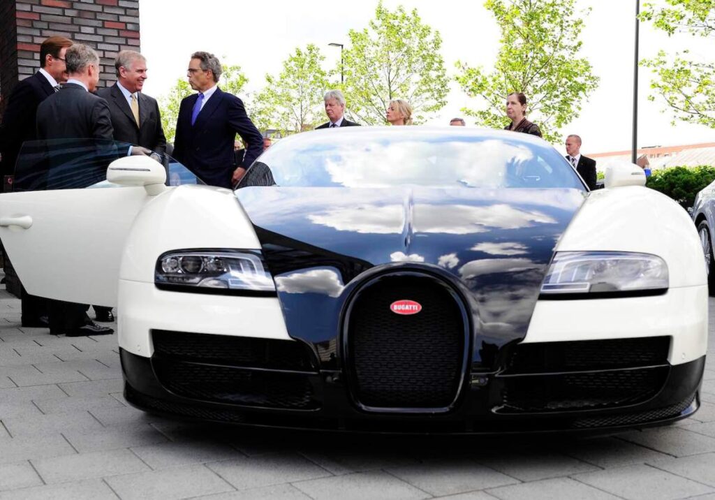 Bugatti owner refuses valet, curbs wheels himself