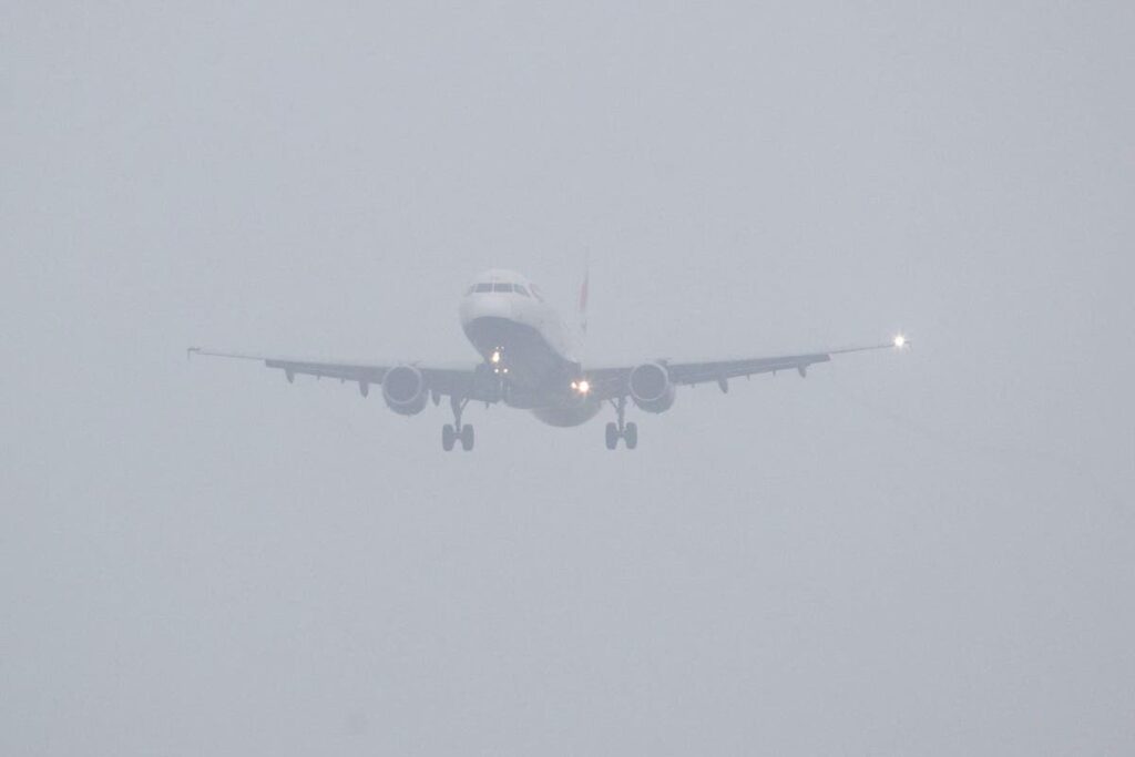 Airport delays LIVE: Passengers facing two-hour delays as fog causes chaos at Manchester and Gatwick