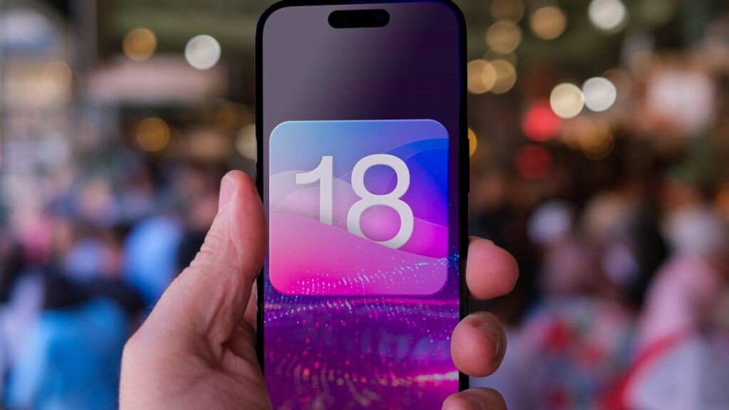 An iPhone held above a crowded market, with a large "18" badge for iOS 18 on the screen.