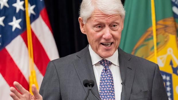 Bill Clinton hospitalized in Washington with fever but 'in good spirits,' spokesperson says