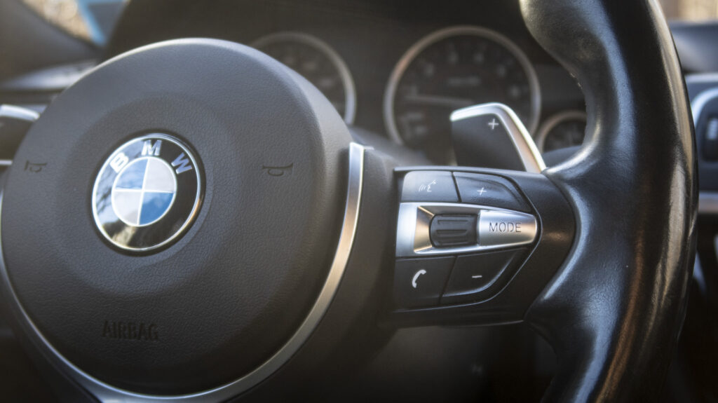 What Was BMW Thinking With These Backwards Steering Wheel Stereo Controls?