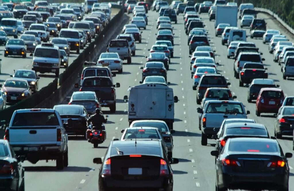 Watch this RAM truck driver get instant karma after trying to run over a lane-splitting motorcyclist