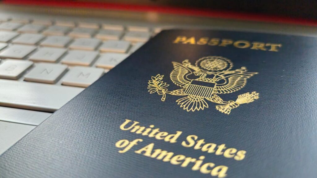 Passport on top of keyboard